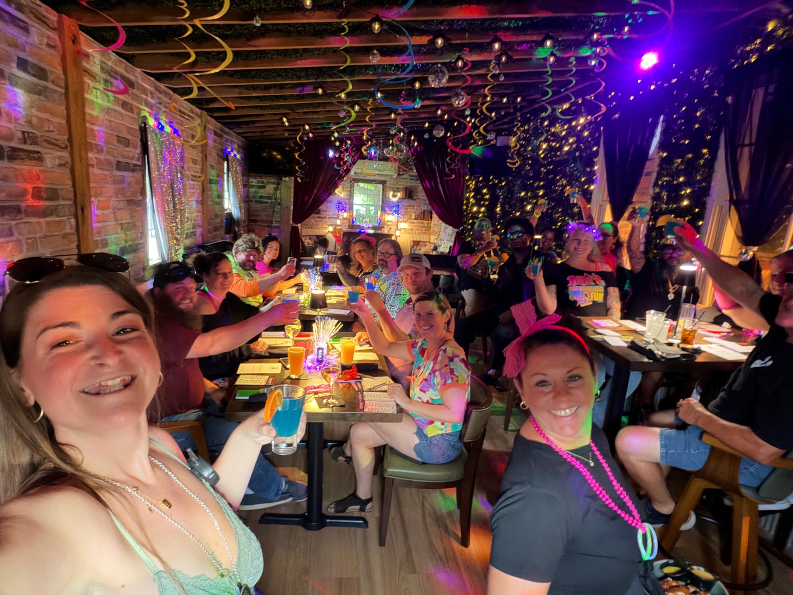 Guests raising a toast during a Murder Mystery Dinner