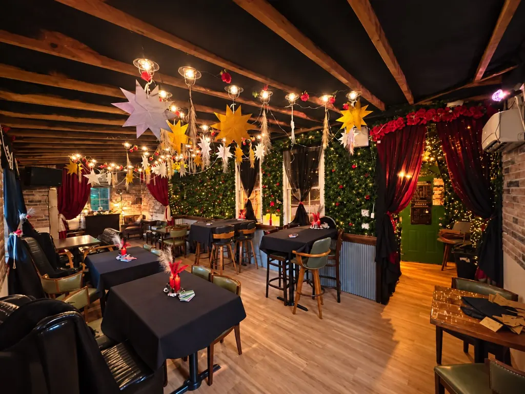 Murder Mystery room with red velvet curtains and decorated tables at The Oak & Ivy Taphouse